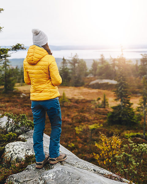 up-lifestyle_header_woman-hiking-near-lake-superior